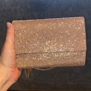 Aldo Rose gold clutch. Elegant night out purse